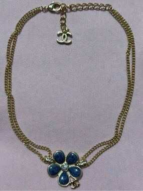 CHANEL Gold-Tone Necklace with Blue Flower Charm